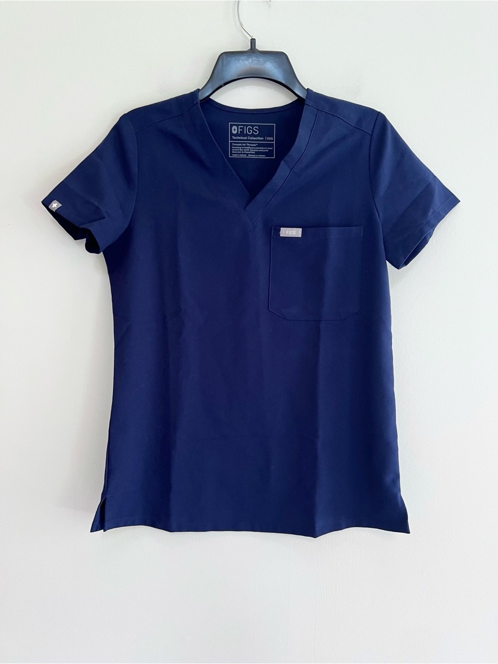 FIGS Women's Catarina One-Pocket Scrub Top in Navy Blue (PO#: 2723), size XXS